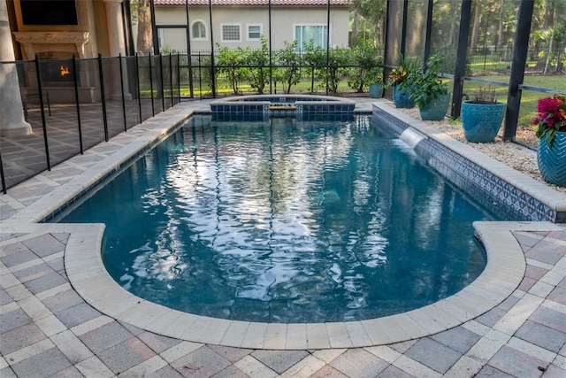 view of swimming pool with central AC and an in ground hot tub