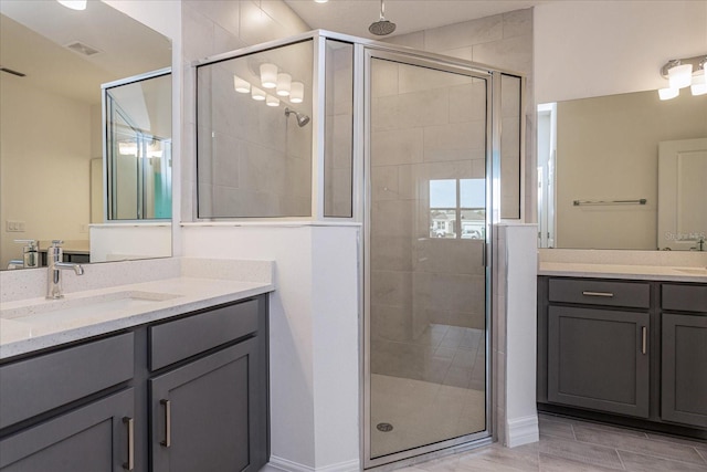 bathroom with vanity and walk in shower