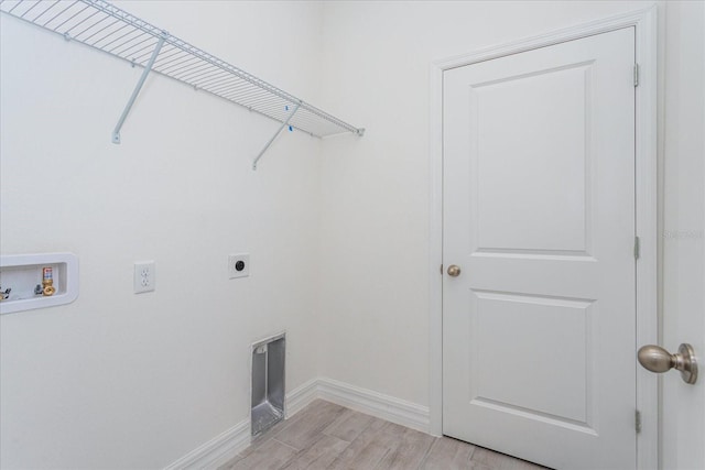 washroom with light hardwood / wood-style flooring, electric dryer hookup, and hookup for a washing machine