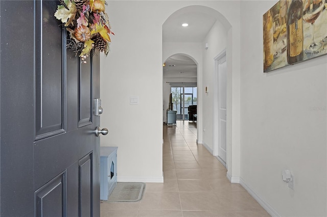 corridor with light tile patterned floors