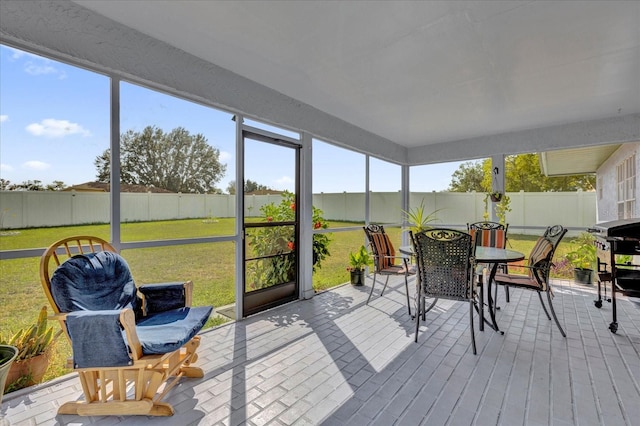 sunroom / solarium featuring a wealth of natural light