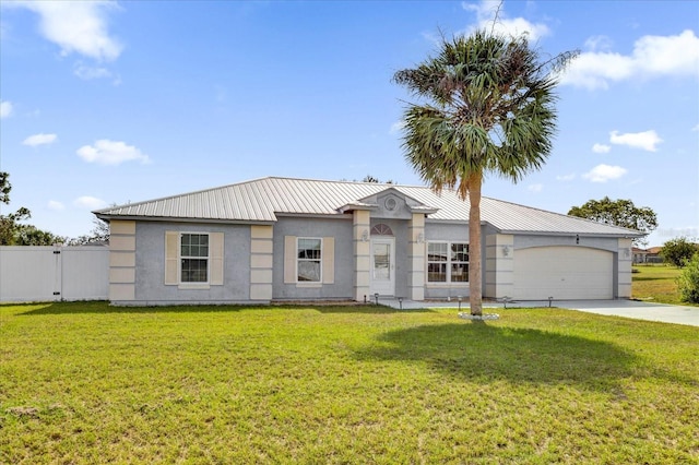 ranch-style home with a front yard and a garage