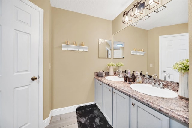 bathroom featuring vanity and wood-type flooring