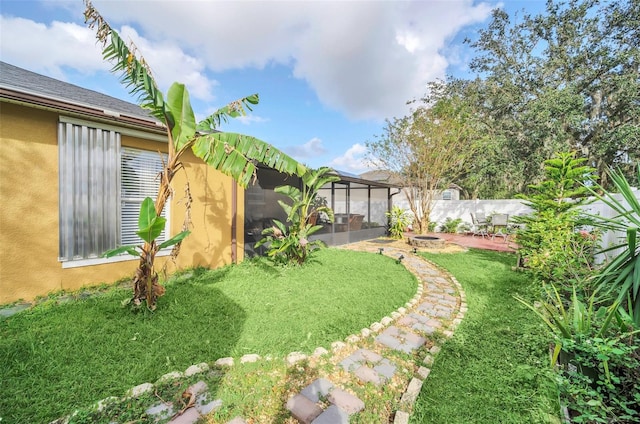 view of yard with a patio area and a sunroom