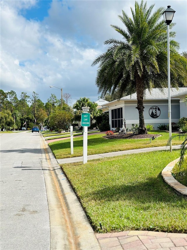 view of front of property with a front lawn