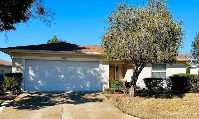 view of front of home with a garage