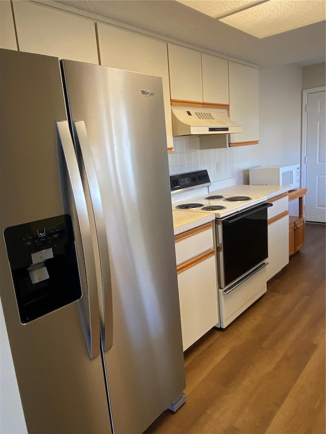 kitchen with stainless steel fridge with ice dispenser, white cabinetry, light hardwood / wood-style floors, backsplash, and white electric range