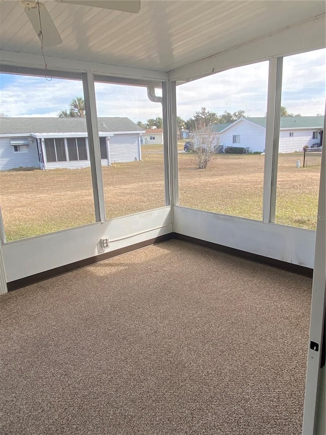 unfurnished sunroom with a healthy amount of sunlight