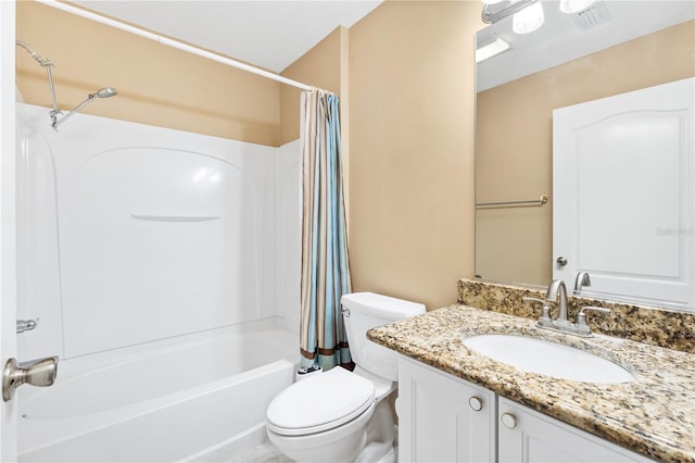 full bathroom with shower / bath combo with shower curtain, vanity, and toilet