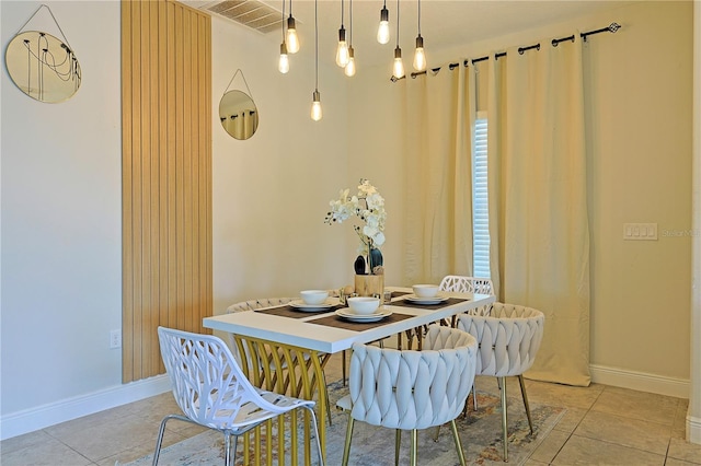 dining room featuring light tile patterned flooring