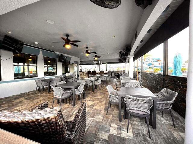 view of patio featuring an outdoor hangout area and ceiling fan