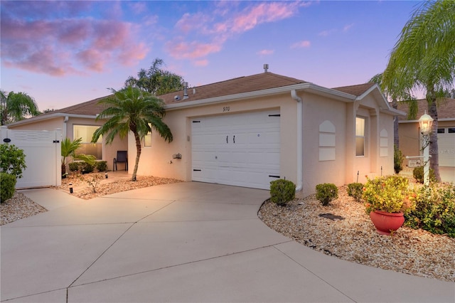 single story home with a garage