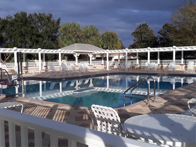 view of pool featuring a patio area