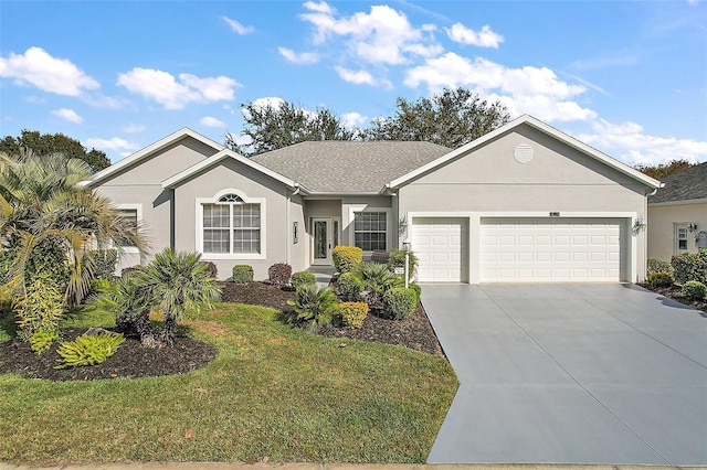 ranch-style home with a garage and a front lawn