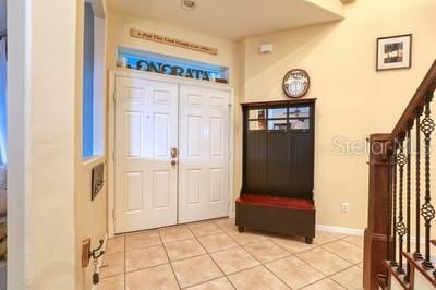 view of tiled foyer entrance