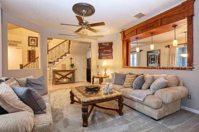 living room with ceiling fan