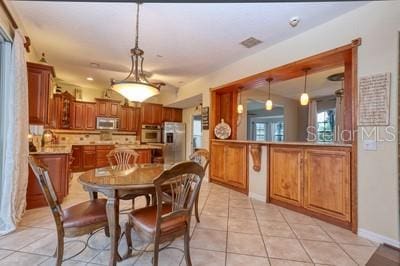 view of tiled dining space