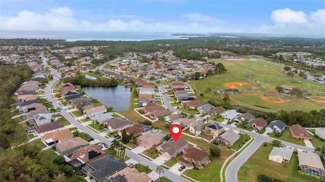 drone / aerial view with a water view