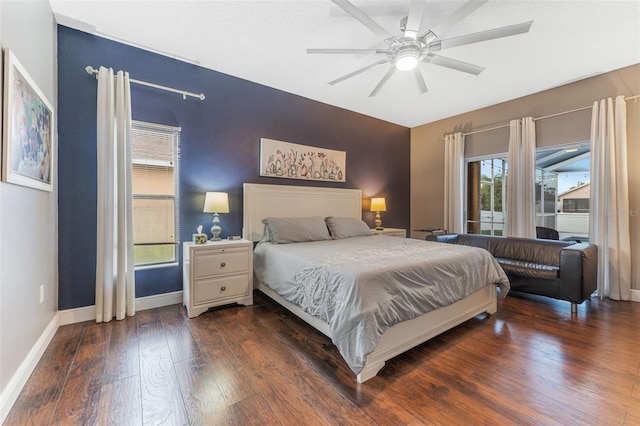 bedroom featuring dark wood-type flooring and ceiling fan