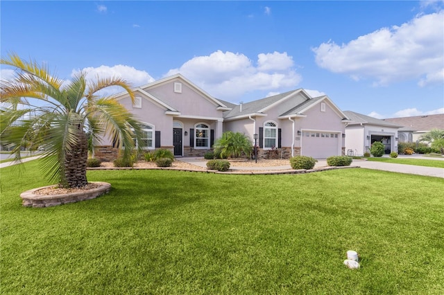 ranch-style house with a front yard and a garage