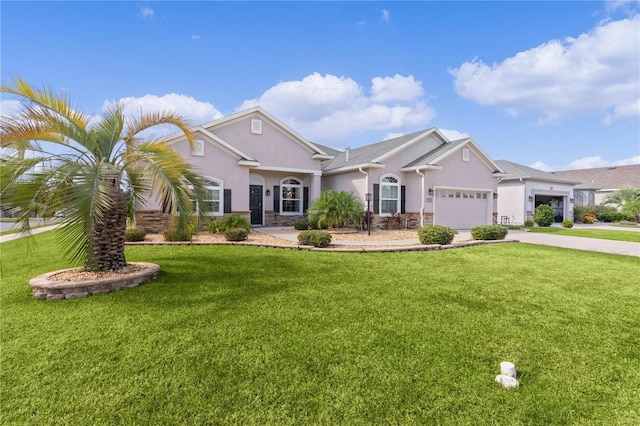 9702 Pepper Tree Pl, Wildwood, FL 34785 - view of front of property with an attached garage, stucco siding, and a front yard