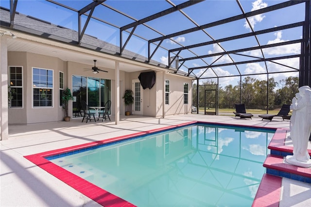 9702 Pepper Tree Pl, Wildwood, FL 34785 - pool featuring a ceiling fan, glass enclosure, and a patio area