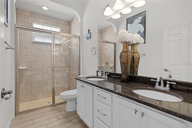 9702 Pepper Tree Pl, Wildwood, FL 34785 - full bath featuring a sink, a stall shower, and toilet