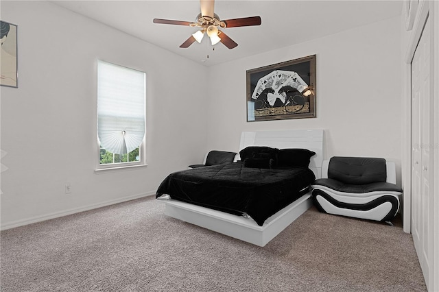 bedroom featuring ceiling fan and carpet flooring