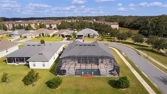 9702 Pepper Tree Pl, Wildwood, FL 34785 - drone / aerial view with a residential view