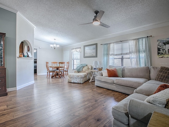 living room with crown molding, a textured ceiling, ceiling fan with notable chandelier, and dark hardwood / wood-style flooring