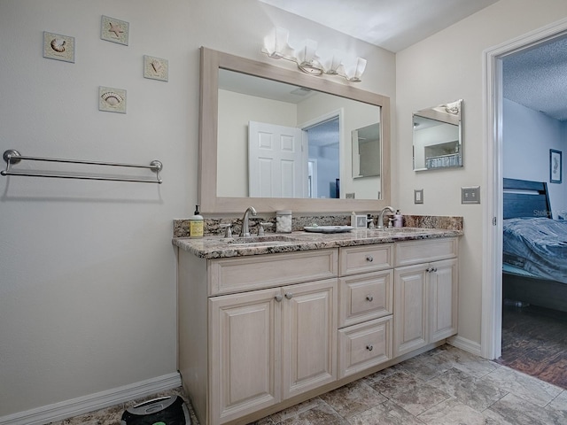 bathroom with vanity and hardwood / wood-style flooring