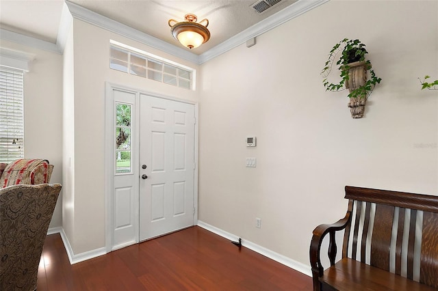 entryway with dark wood-type flooring and ornamental molding