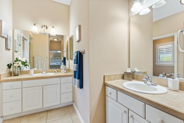 bathroom with vanity and tile patterned floors