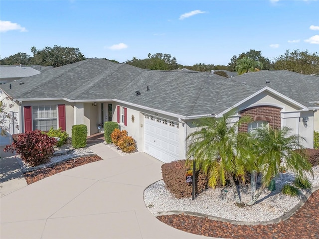 ranch-style home featuring a garage