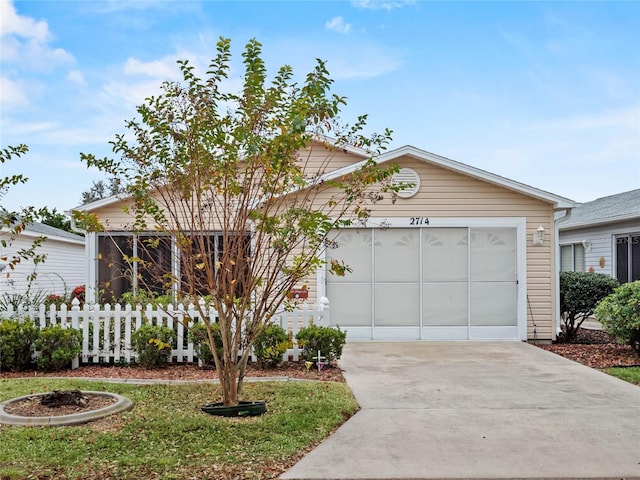 view of front of property featuring a garage