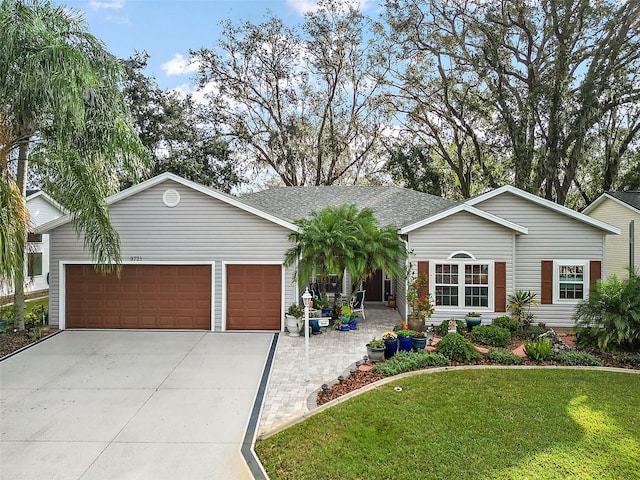 single story home with a front lawn and a garage