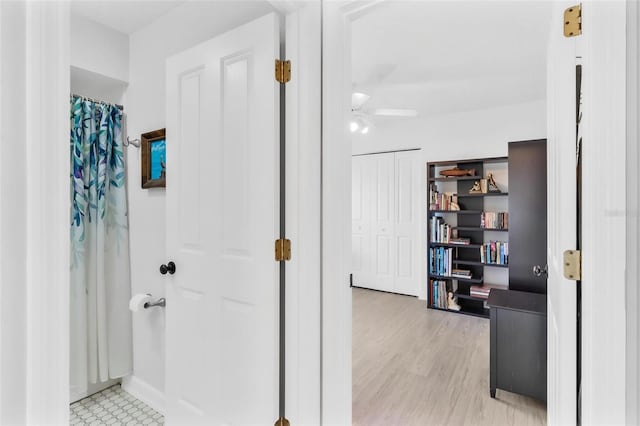 hallway featuring light wood-type flooring