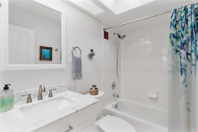 full bathroom with shower / bath combo, vanity, and toilet