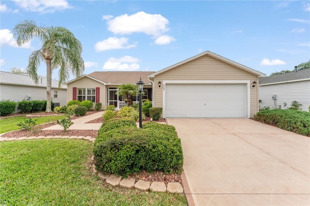 single story home featuring a garage and a front yard