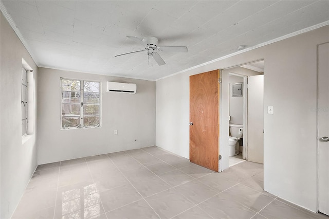 tiled spare room with ceiling fan, ornamental molding, and a wall mounted air conditioner