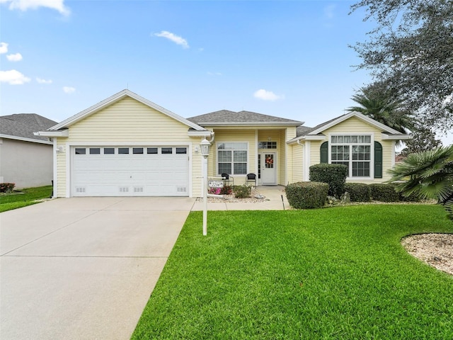 ranch-style house with a front yard and a garage