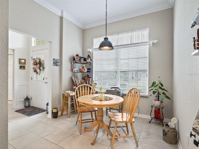 tiled dining space with ornamental molding