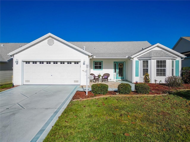 single story home featuring a front lawn and a garage