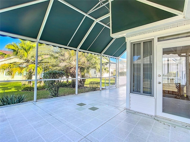 view of patio / terrace with glass enclosure