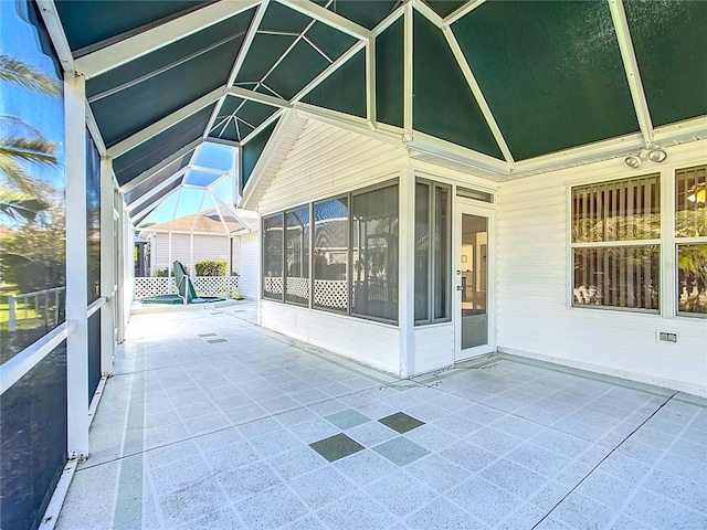 view of patio / terrace featuring a lanai and a sunroom