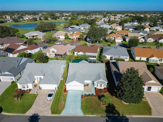 drone / aerial view with a water view