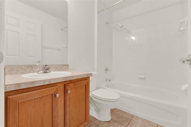 full bathroom with toilet, tiled shower / bath combo, vanity, and tile patterned flooring