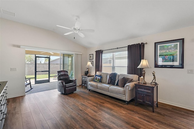 living room featuring ceiling fan, vaulted ceiling, and dark hardwood / wood-style floors