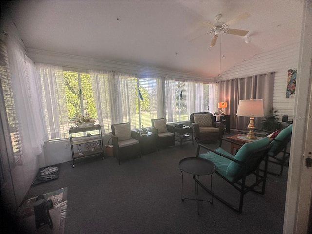 sunroom with a wealth of natural light, lofted ceiling, and ceiling fan