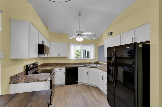 956 Chula Ct, The Villages, FL 32159 - kitchen with ceiling fan, white cabinets, black appliances, a sink, and dark countertops